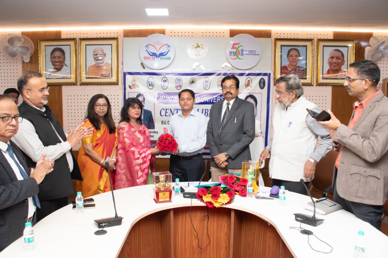 Bouquet presented to DrillBit representative at Library Week 2025