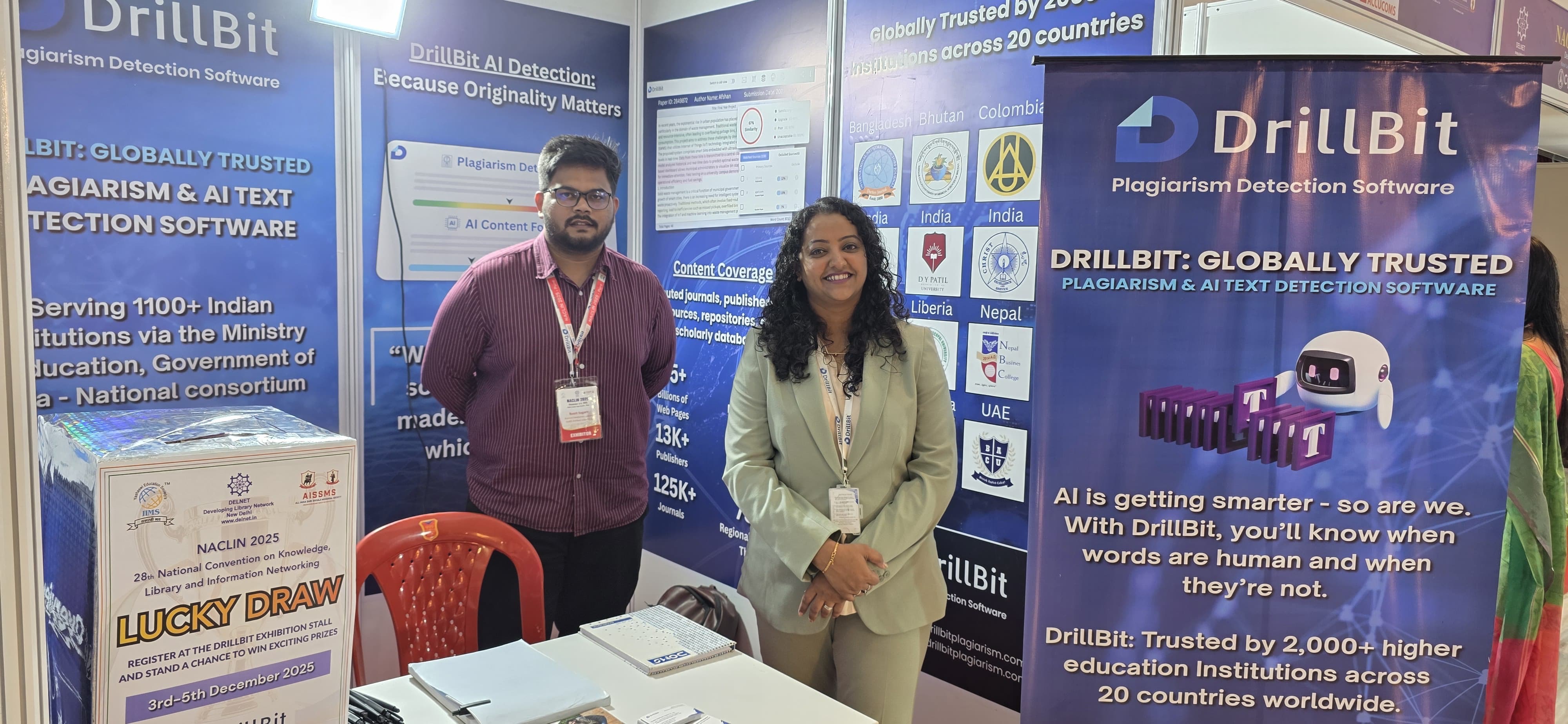 DrillBit team at exhibition booth, NACLIN 2025
