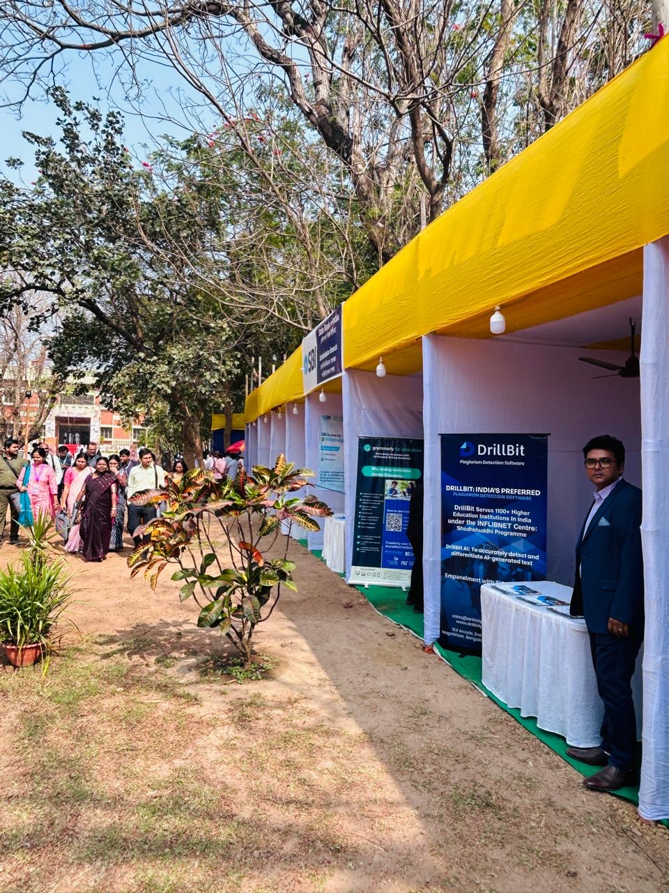 DrillBit outdoor exhibition booth at RLUIKS 2025, Santiniketan